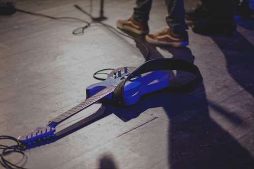 Guitar laying on the stage