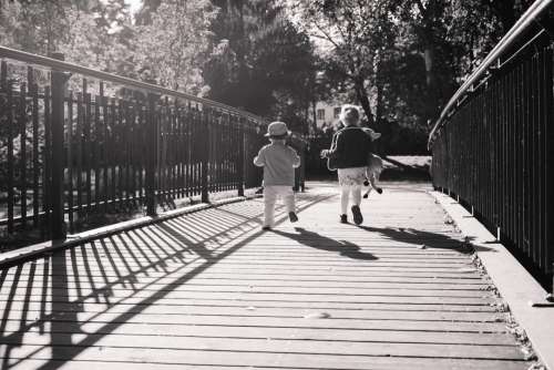 Kids running across the bridge 2