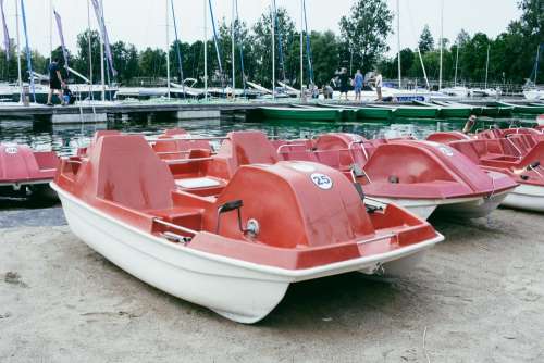 Paddle boats at the lake harbor