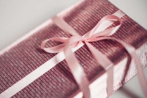 Pink Christmas gift blurred