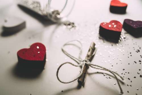 Tiny letter and wooden hearts