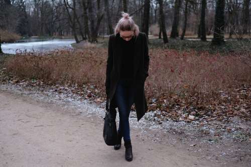 A woman posing in the park