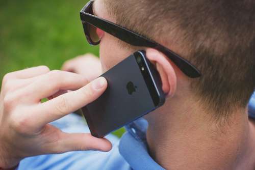 Young man talking on the phone 5