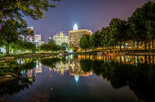 Across the lake looking at Charlotte at night in North Carolina free photo