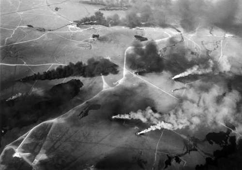 Aerial view of oil wells on fire in the Gulf War free photo