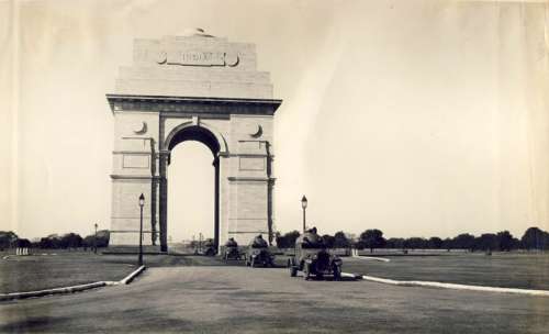 Armoured cars passing through India Gate in 1930s in Delhi free photo