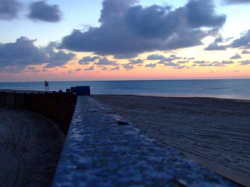 Ashdod beach with dusk sky and clouds in Israel free photo