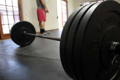 Barbell on Gym Floor free photo