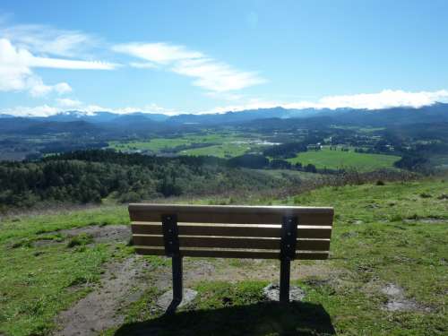 Bench overlooking the Valley landscape in Oregon free photo