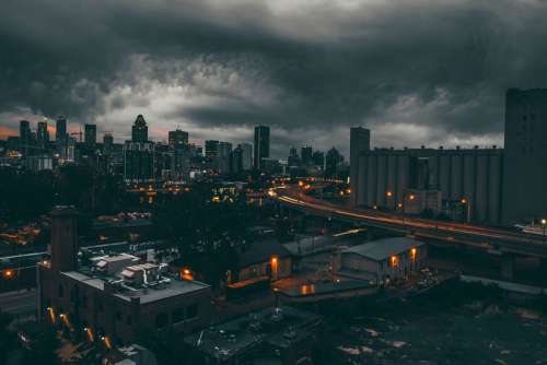 Black Clouds over the Night Time Cityscape of Montreal, Quebec, Canada free photo