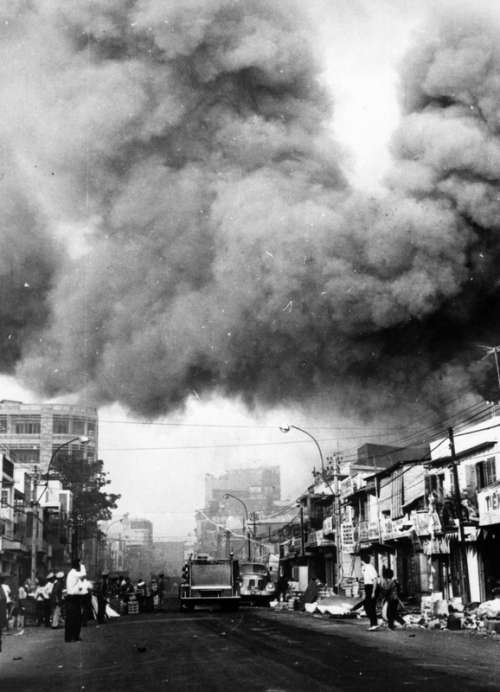 Black smoke covers areas of Sài Gòn during Tet Offensive in the Vietnam War free photo