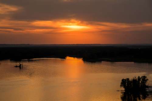 Bright Sunset over Mississippi Waters free photo