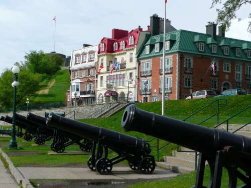 Cannons in front of the houses in Quebec City, Canada free photo