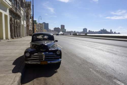 Car Parked by the roadside in Havana, Cuba free photo