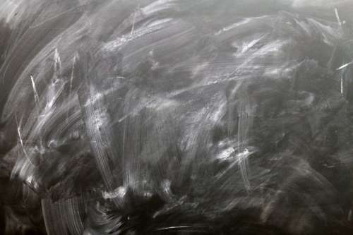 Chalkboard blackboard with eraser marks free photo