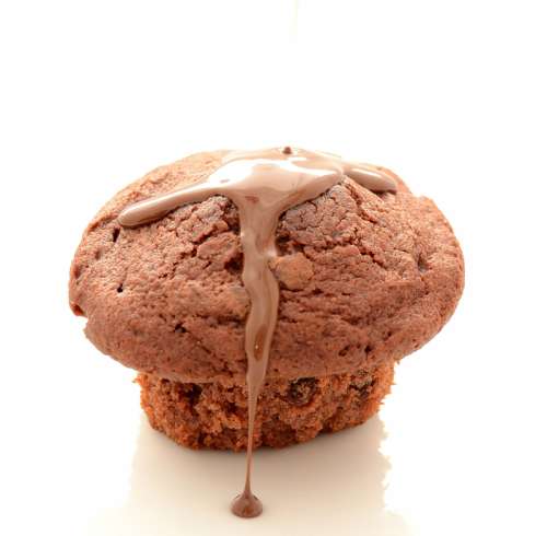 Chocolate Cupcake dripped with Chocolate Fudge free photo