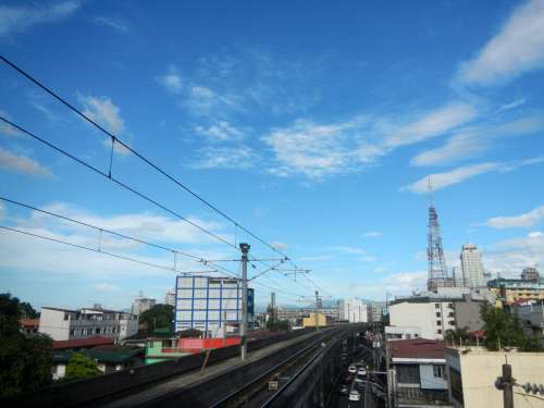 Cityscape of buildings and Marcos Bridge in Quezon City, Philippines free photo