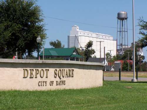 Depot Square with one of many Rayne rice mills in Louisiana free photo