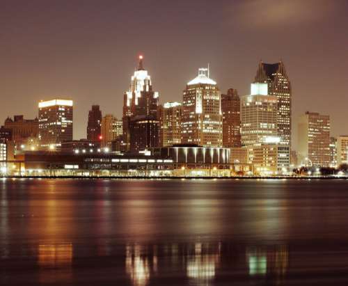 Detroit skyline with night lights in Michigan free photo