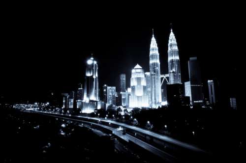 Downtown cityscape of Kuala Lumpur at night in Malaysia free photo