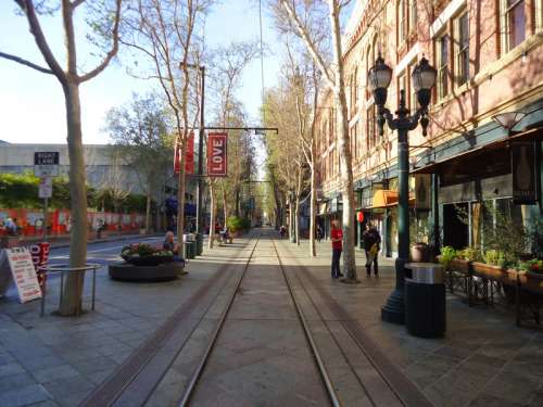 Downtown San Jose sidewalk in San Jose, California with trees and buildings free photo