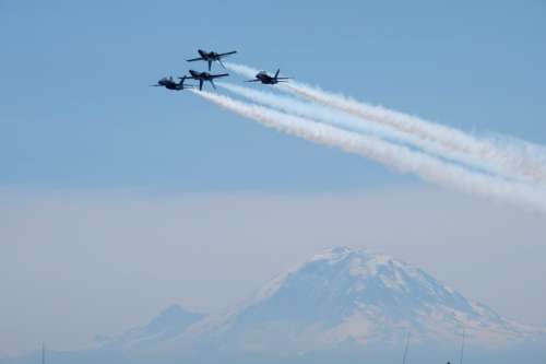 Four jets flying in formation free photo