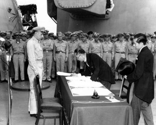 Japanese foreign affairs minister signing Japanese Surrender of World War II free photo