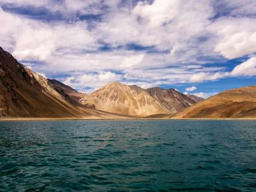 Landscape with mountains, sky, and clouds in Ladakh, India free photo