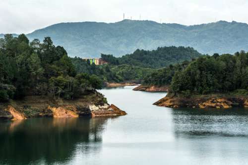 Landscape with river and forest in Guatape, Colombia free photo