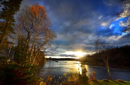 Late Afternoon Lights with clouds and landscape in Quebec, Canada free photo