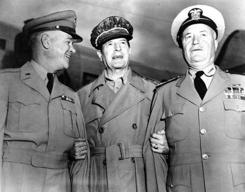 MacArthur with two of his generals during the Korean War free photo