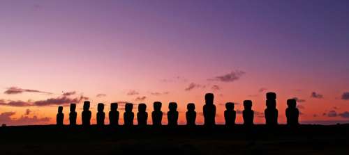 Moai Statues at Dusk in the landscape on Easter Island, Chile free photo
