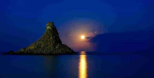 Moonlight over the Ocean and Island in Sicily, Italy free photo