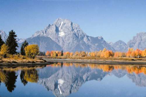 Mount Moran and Lake reflection landscape in Grand Teton National Park, Wyoming free photo