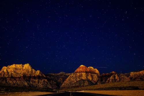 Mountains and Road under the stars free photo