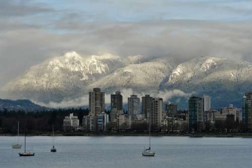 Mountains in the landscape behind the skyline of Vancouver, Canada free photo