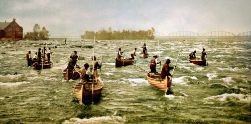 Ojibwe fishermen in the St. Marys Rapids, 1901 in Sault Ste. Marie in Ontario, Canada free photo