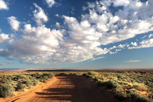 Path under the clouds in Utah near Hanksville free photo