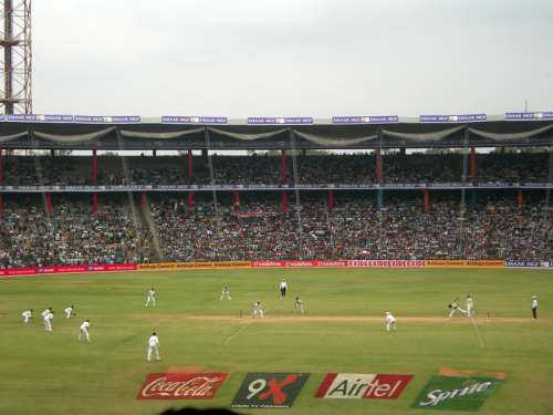 People playing cricket at M. Chinnaswamy Stadium in Bangalore, India free photo