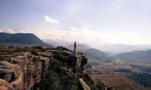 Person overlooking the landscape at Mkhomazi Wilderness area, South Africa free photo