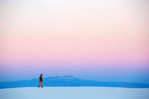 Person walking on the white sands landscape, New Mexico, Landscape free photo