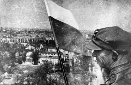 Polish flag raised on the top of Berlin Victory Column after Battle of Berlin free photo