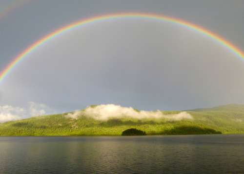 Rainbow over the landscape in British Columbia, Canada free photo