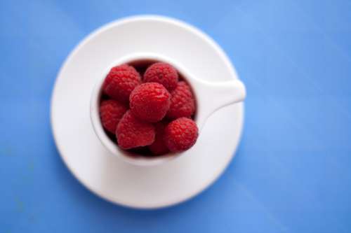 Raspberries in a Cup free photo