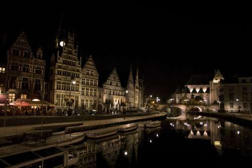 River and cityscape at night in Ghent, Belgium free photo