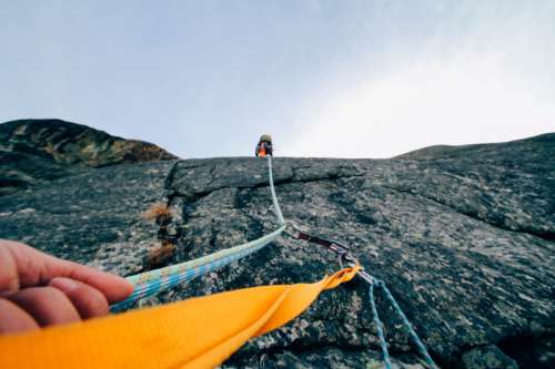 Rock Climbing with Cords and Ropes free photo
