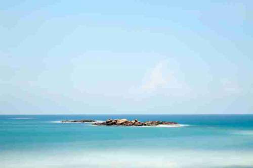 Rock Island in the ocean in Sri Lanka free photo