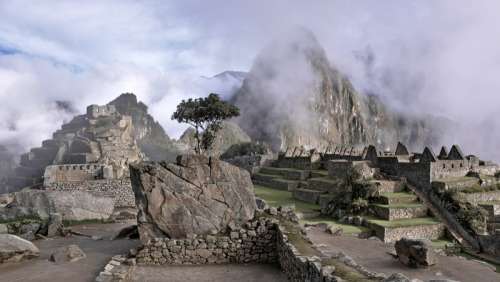 Ruins close-up and view of the temples in Machu Picchu, Peru free photo