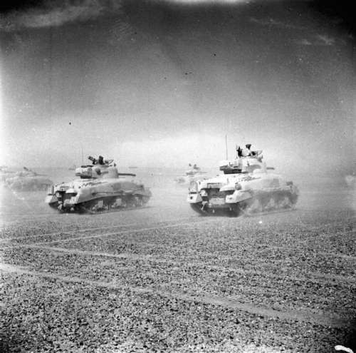 Sherman tanks of the eighth Army move across the desert at the Second Battle of El Alamein free photo