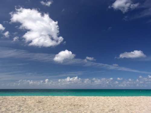 Sky, beach, and ocean horizon in Jamaica free photo